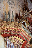 Vientiane, Laos - Wat Si Saket, detail of the decorations of the sim. 